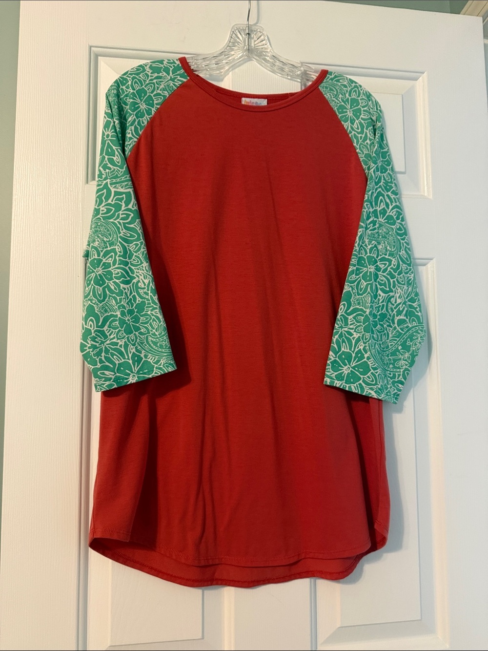 LuLaRoe Women's Red Raglan Top with Green Floral Sleeves